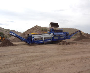 trommel screen working on topsoil