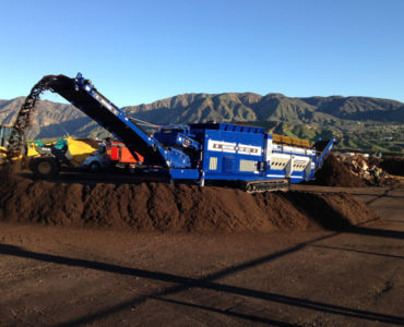 mobile trommel screen working on compost